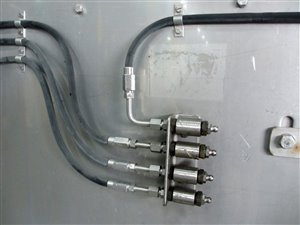 De-watering conveyor belt