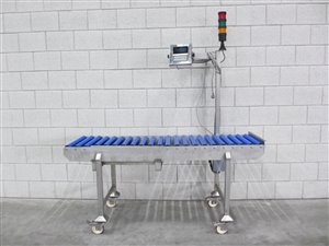 Roller conveyor with weighing zone and weighing indicator