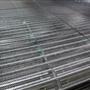 De-watering conveyor belt
